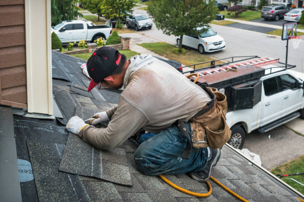 Professional Roofing technician working in Mills River, NC